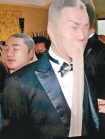 謝天華鄭伊健遭絲襪套頭。